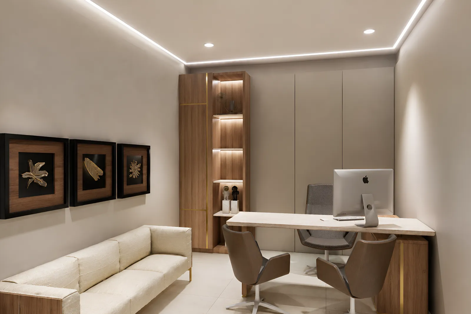 The back office: cove-lit, cream and walnut, with three gold botanical pieces above the sofa